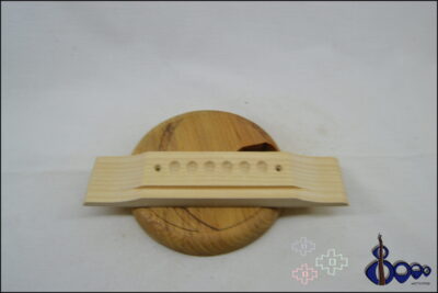 Martin style bridge for acoustic guitar